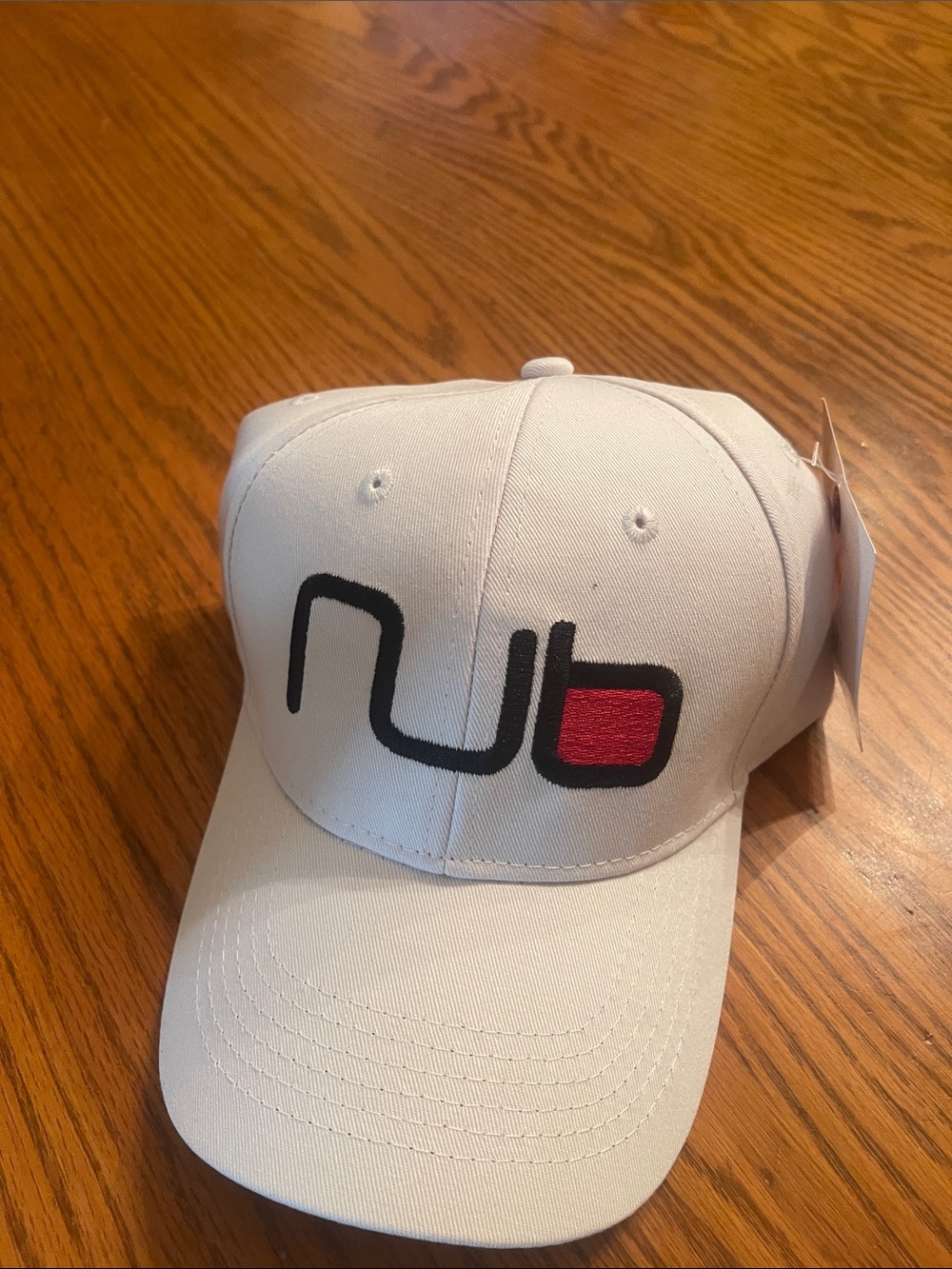 Embroidered White Baseball Cap with Red Accent